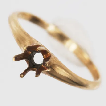 Ringskena, saknar sten, stl: 18, 18K guld  Vikt: 2,2 g