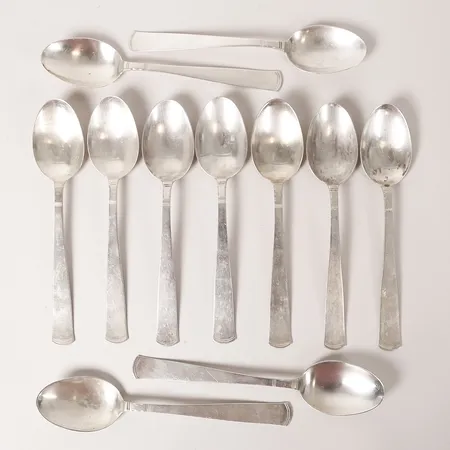 Elva bordsskedar, modell Rosenholm, formgiven av Jacob Ängman, GAB, Stockholm, 1945, längd 18cm, bruksslitage, silver Vikt: 458,5 g