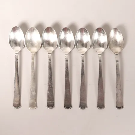 Sju kaffeskedar, modell Rosenholm, formgiven av Jacob Ängman, GAB, Stockholm, 1962, längd 12cm, bruksslitage, silver Vikt: 107,4 g
