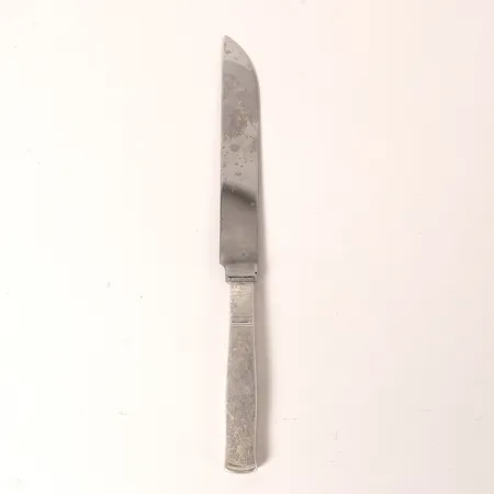 Ostkniv, modell Rosenholm, formgiven av Jacob Ängman, GAB, Stockholm, 1945, längd 18cm, bruksslitage, silver och stålblad, bruttovikt 30,3g Vikt: 0 g