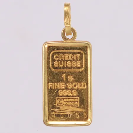 Hänge guldtacka Credit Suisse fine gold 999,9, 9x23mm, ram och ögla i 18K Vikt: 1,3 g