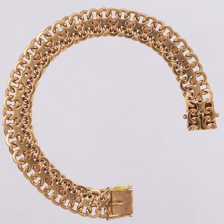Armband X-länk, Norens Guldatelje år 1965, längd 19cm, bredd 11,5mm, 18K Vikt: 32,6 g