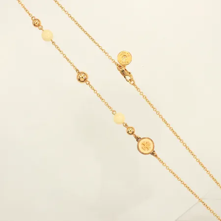 Collier, Tory Burch, gul metall,  längd 94cm, bredd 1,8-12mm, delar med missfärgad metall