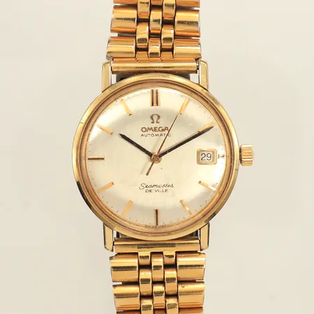 Armbandsur Omega Seamaster De Ville, automat, Ø34mm, guld på stål, datum, repigt plexiglas, länk i guldfärgat stål, ej original, sliten, längd 20cm