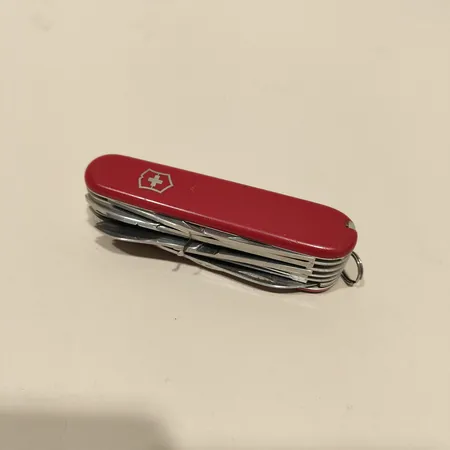 Fickkniv Swiss Army /multiverktyg, ca 9cm, något defekt, bruksslitage.