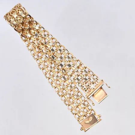 Armband X.länk, längd 19,5 cm, bredd 15 mm, 18K. Vikt: 33,8 g