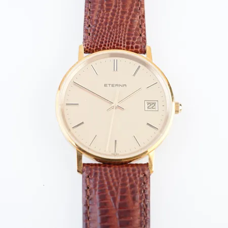 Herrur Eterna, quartz, ca 34mm,18k, orginalarmband, batteribyte krävs, gravyr bakboett