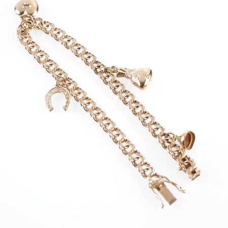 Armband m 4 berlocker, bismarck, 18,5cm, bredd 5mm, 18k Vikt: 12,2 g