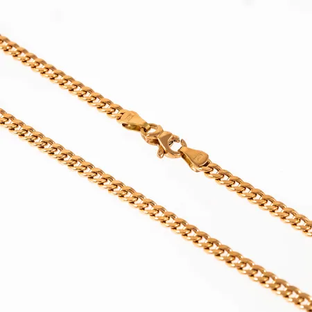 Kedja ihålig pansar i 18K guld. Den är 48 cm lång, 3,4 mm bred och väger 8,6g. Karbinhake. Stämplad GHA 750.