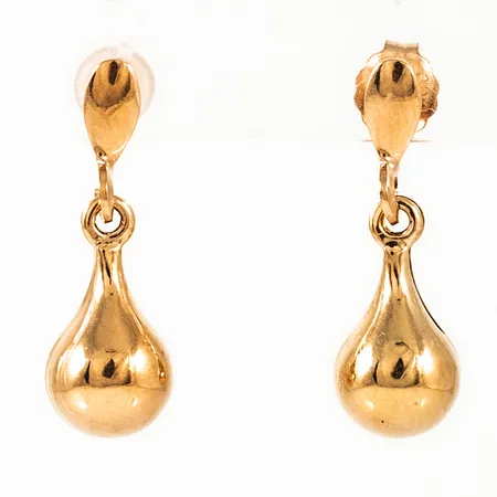 Örhängen i 18K guld: Hängande droppar. De är 18 mm långa, 6 mm breda och väger 0,9g. En snurrebuss saknas, men ny i plast medföljer.