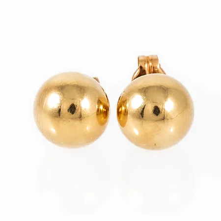 Örhängen i 18K guld: Släta kulor Ø 8 mm. Vikt: 0,8g. Mörka på baksidan.