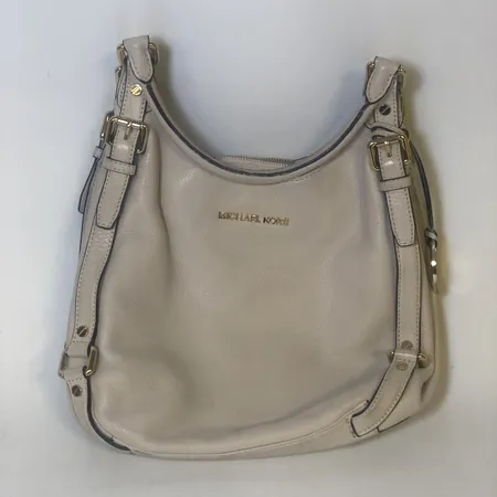 Handväska Michael Kors, cremefärgad, höjd inkl. handtag ca 45cm, bredd ca 28cm, 3 fack, slitage och missfärgningar