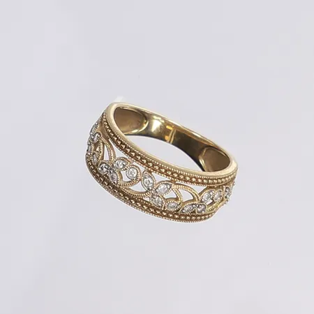 Ring med diamanter 20x ca 0,01ct, stl 17¼, bredd 3,5-8mm, 18K Vikt: 4,2 g