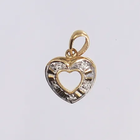 Hänge hjärta med diamanter totalt ca 0,02ctv, 14x10mm, 18K Vikt: 0,7 g