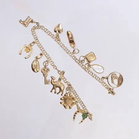 Armband, bismarck med berlocker, längd 18cm, 14-18K berlocker, defekt, 18K Vikt: 12,2 g