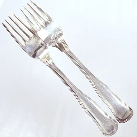 22 Skedar, 6 Gafflar, 1 Kaktåg, 2 Såsslevar, silver 830/1000  4 Knivar, silver bruttovikt: 259g, totalvikt 1898,0g