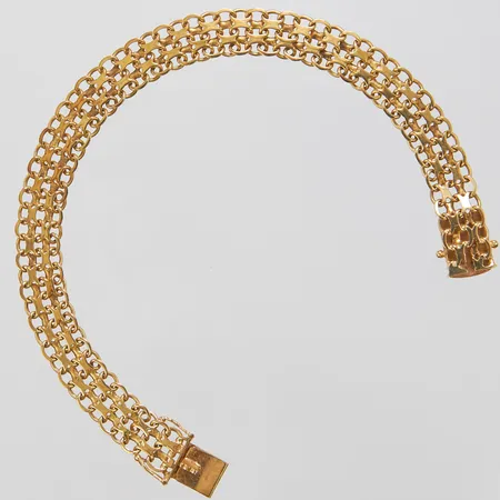 Armband X-länk, längd ca 18cm, bredd 8mm, Bäckmans Guldsmedja Ab Leif A, år 1966, 18K Vikt: 11,5 g