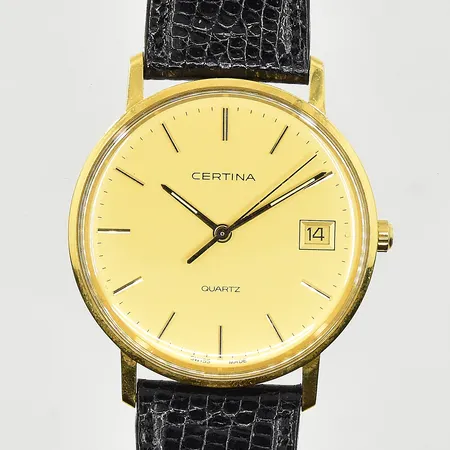 Herrur Certina 18K, boett Ø34 mm, quartz, datum, läderband, behov av batteribyte, graverad bakboett, inga tillbehör, bruttovikt 27,6g.