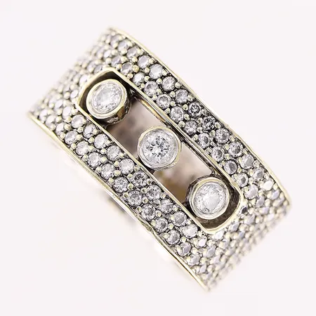 Ring, diamanter ca 124 x ca 0,01ct, 3 x ca 0,04ct infattade rörligt i skenan, stl 17, bredd 10mm, i behov av rodiering, vitguld, 18K Vikt: 10,4 g