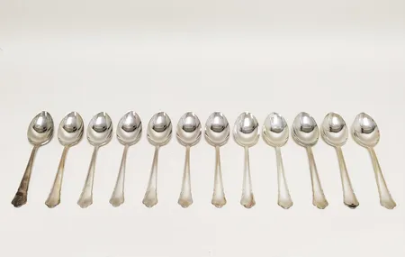 12 Bordsskedar, modell: Chippendale, längd: 180mm, GAB, enstaka något missfärgade, silver 830/1000 Vikt: 516,8 g