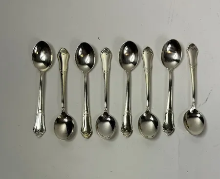 8 skedar, modell Eva, längd 11 cm, MEMA, tillverkade 1980-1990-tal, 830/1000 silver. Vikt: 113,3 g