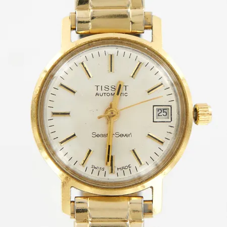 Damur Tissot Seastar Seven, automatisk, boett 18K, flexlänk i förgylld metall, något lös krona, i behov av service, gravyr bruttovikt 31,6 gram