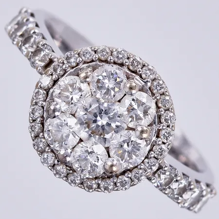 Ring med diamanter ca 1,50ctv enligt gravyr: GHA, stl: 17, bredd ca 4-12mm, 18K Vikt: 7,3 g