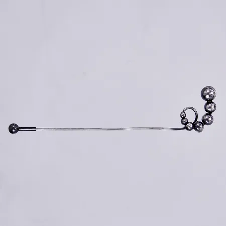 Hattnål, Guldvaruaktiebolaget G. Dahlgren & Co Ab 1959, bucklig nål, längd ca 10,5cm, silver Vikt: 3,8 g