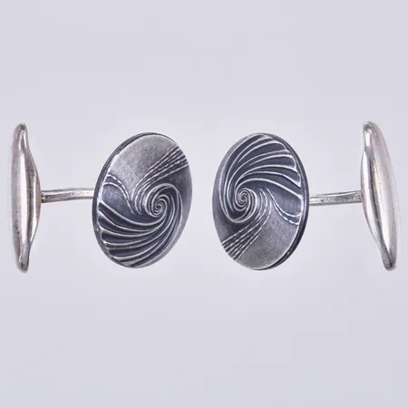 Ett par manschettknappar, Ø ca 18mm, sporrong, år 1973, 830/1000, silver Vikt: 16,6 g