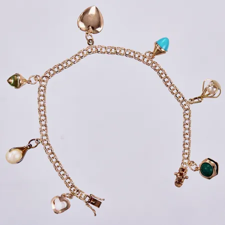 Armband Bismarck med sju berlocker, längd: ca 18,5cm, bredd: ca 4mm, en berlock och en ögla i metall, GHH, Guldsmedjan Hilden Holger, Sala, år 1966, 18K Bruttovikt 10,6g Vikt: 10,6 g