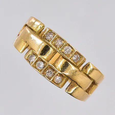 Ring med diamanter ca 0,12ctv, stl 17¼, bredd 5-8,2mm, 18K Vikt: 4,8 g