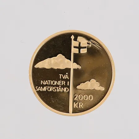 Jubileumsmynt, Två Nationer i Samförstånd 1905-2005, ca Ø21mm, 21,6K guld, etui.  Vikt: 12 g