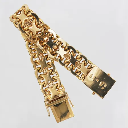 Armband, X-länk, Nordiska Guldvaru-Aktiebolaget, Malmö år 1960, längd: 20 cm, bredd: 18 mm, 18K guld. Vikt: 121,9 g