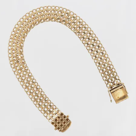 Armband, X-länk, August Mikkov AB, Stockholm år 1963, längd: 20 cm, bredd: 12 mm, 18K guld. Vikt: 19,4 g