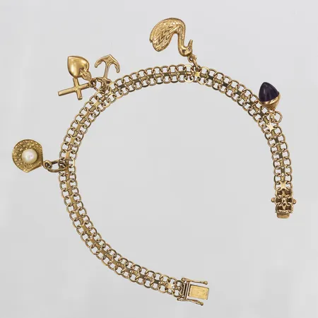 Berlockarmband, X-länk, lila sten, längd: 19,5 cm, bredd: 6 - 24 mm, 18K guld. Vikt: 12,1 g