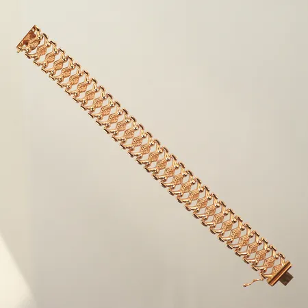 Armband, längd 19,5cm, bredd 17mm, 18K, 22,2g 
