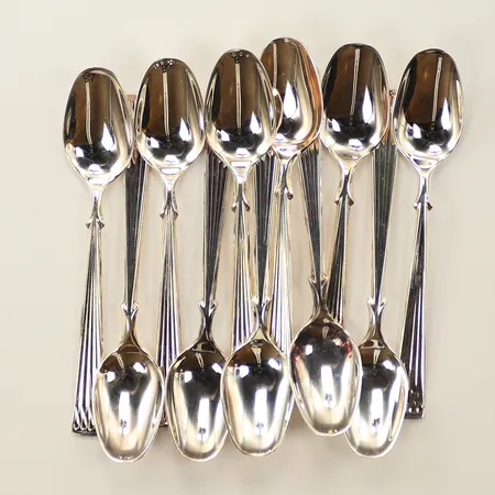 Elva kaffeskedar, längd 11,5cm, bredd 10-23mm, Th. Marthinsen, silver 830/1000, 108,7g Vikt: 108,7 g