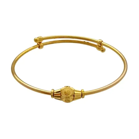 Armring, 21K guld, inre omkrets 12,5 cm (liten modell / barnmodell), något justerbar, bredd 1,3 - 5 mm, fint skick Vikt: 3,5 g