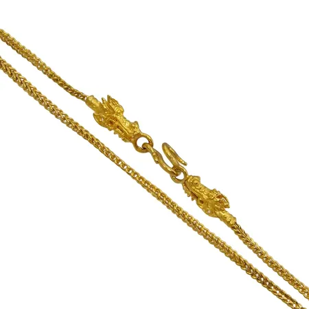 Halskedja, 23K guld, ändar med drakhuvud, längd 44,0 cm, bredd 2 mm, något vågig kedja, 1 baht Vikt: 15,2 g