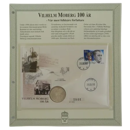 "Myntbrev" med silvermynt - 2 Krona 1938, silver 80% (15 gram), Vilhelm Moberg 100 år, 1998, smakfullt monterat i plastficka med information på baksidan, yttre mått 24,5x22 cm, nr 2844/4000