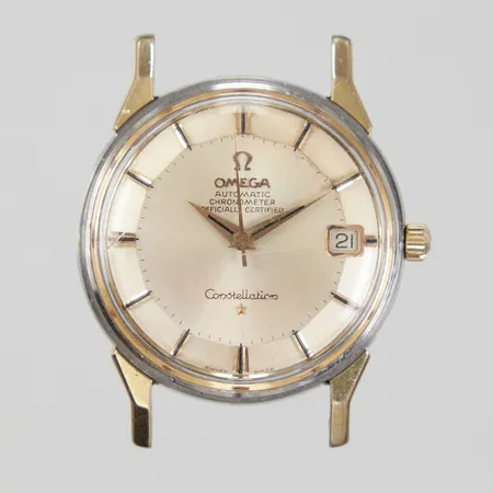 Herrur Omega Constellation, Pie-Pan, Ø34mm, automatic, datum, stål, Caliber 561 , Serienummer: 24493110, Boettnummer: 168.005, repigt glas, urtavla med fläckar, saknar boettring, utan länk/läderband, inga tillbehör.