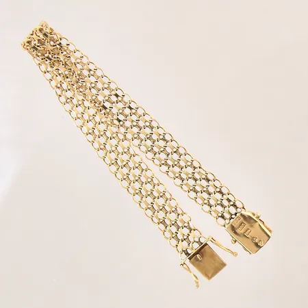 Armband X-länk, längd 19,5cm, bredd 10mm, skadade länkar, buckligt lås,18K.  Vikt: 13,4 g