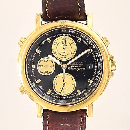 Herrur Seiko Chronograph, referens-nr: 7T42-7A2A, serie-nr: 477716, Ø38mm, läderband ej original/slitet, slitage, datum, guldfärgad stål, inga tillbehör. 