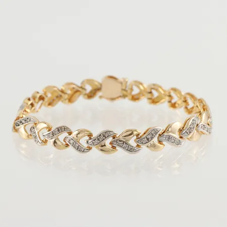 Armband med diamanter ca 72x0,01 ct,  längd 17.5 cm, bredd ca 7,5 mm, 14k Vikt: 16 g