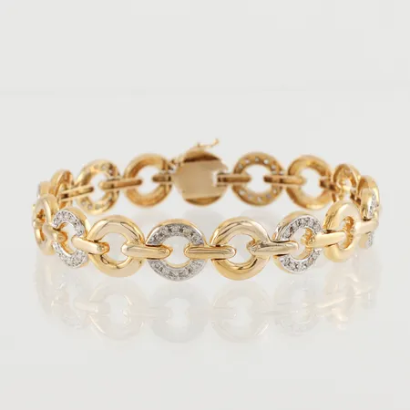 Armband med diamanter ca 80x0,01ct, längd 20 cm, bredd ca 12 mm, 14k Vikt: 26,3 g