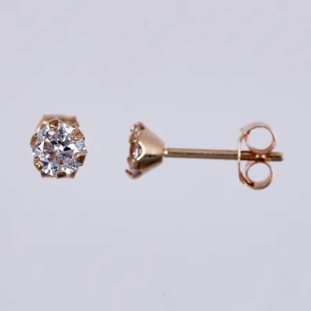 Ett par örhängen med vita stenar, Ø ca 4mm, 18K  Vikt: 0,6 g