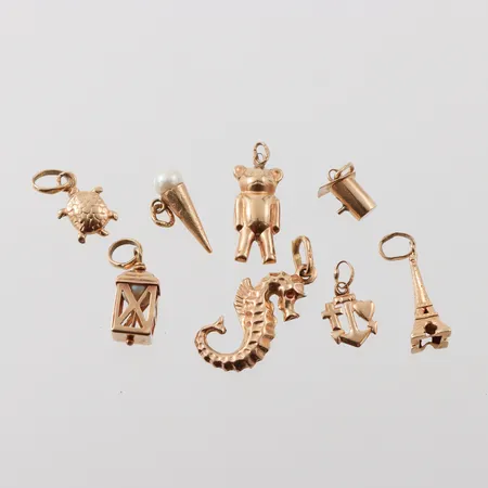 Berlocker 8st 18k Vikt: 6,6 g