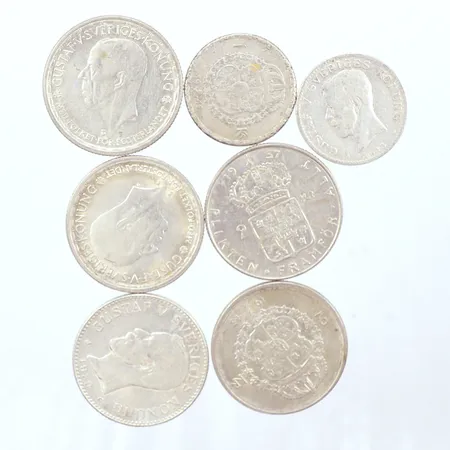 3 mynt silver 80% 29,2gr  4 mynt silver 40% 56,1gr,  totalvikt  brutto 85,3gr  Vikt: 86,3 g