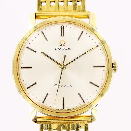 Herrur Omega, Genéve, 18K, manuell, Ø34mm, vit urtavla, länk i gulmetall ej original, ca18,5cm, gravyr, bruttovikt 59,2g, fodral ej original, inga tillbehör.