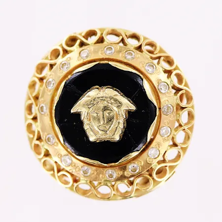 Ring, medusa, svart och vita stenar, stl 17½, bredd 2-25mm, sprickor i stenplatta, skev skena, 14K Vikt: 7,4 g